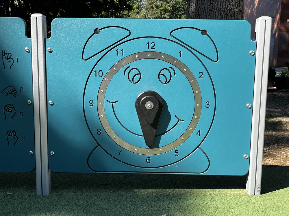 Playground Clock hands at 6:30