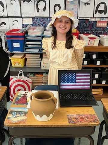 Student presenting Wax Museum